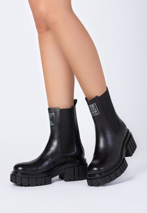 Ankle boots - black