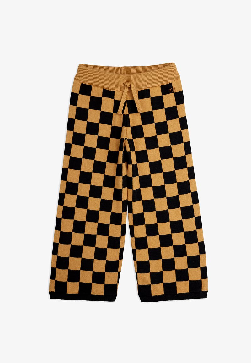 Pantalon à jambes larges avec motif damier noir et beige et une ceinture à cordon côtelée beige.