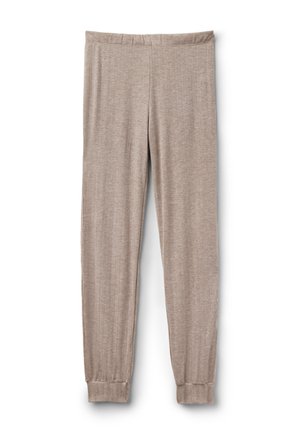 Leggings en coton beige avec une texture douce, des jambes fuselées et une taille élastique. Présente un design simple et sans embellissement.