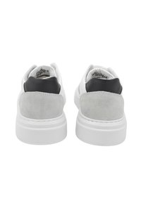 Sneakers with a white mesh upper, gray suede heel accents, and black leather detailing. Features a thick white rubber sole.