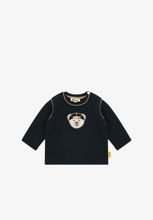 Chemise noire à manches longues avec une texture matelassée sur les manches, ornée d'un visage d'ours brodé sur le devant et d'un bord contrastant.