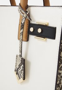 ALDO KRUZEEX - Handtas - white/bone