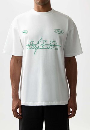 White cotton t-shirt with green graphic text "BALR." on the front and sleeves. Boxy fit with short sleeves and a round neckline.