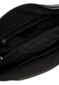 Black zippered clutch bag made of textured material, featuring multiple interior compartments and a smooth fabric lining.