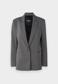 Gray blazer made of textured fabric. Features a notched lapel, two front buttons, and a single chest pocket. Lined interior.