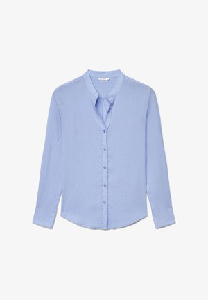 Blusa azzurro chiaro a maniche lunghe con colletto alla coreana, chiusura frontale con bottoni e tessuto leggermente strutturato.