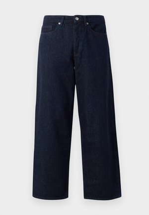 Tumedad sinine denim laiad püksid, mis on varustatud nööpkinnitusega, esikottide ja peenee tekstuuriga, sirgete servade ja mugava istuvusega.