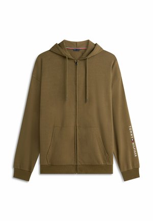 Felpa con cappuccio verde oliva con zip, tasche frontali, cappuccio con coulisse regolabile, polsini a coste e logo "Tommy Hilfiger" sulla manica destra.