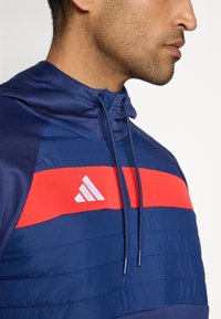 adidas Performance TIRO ESSENTIALS WINTERIZED TOP - Hættetrøje - team navy blue/red/white
