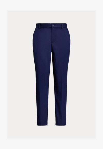 Tumši zili bikses no gluda auduma ar taisnu griezumu, jostas cilpām, priekšējām kabatām un vienu pogu aizdarei.