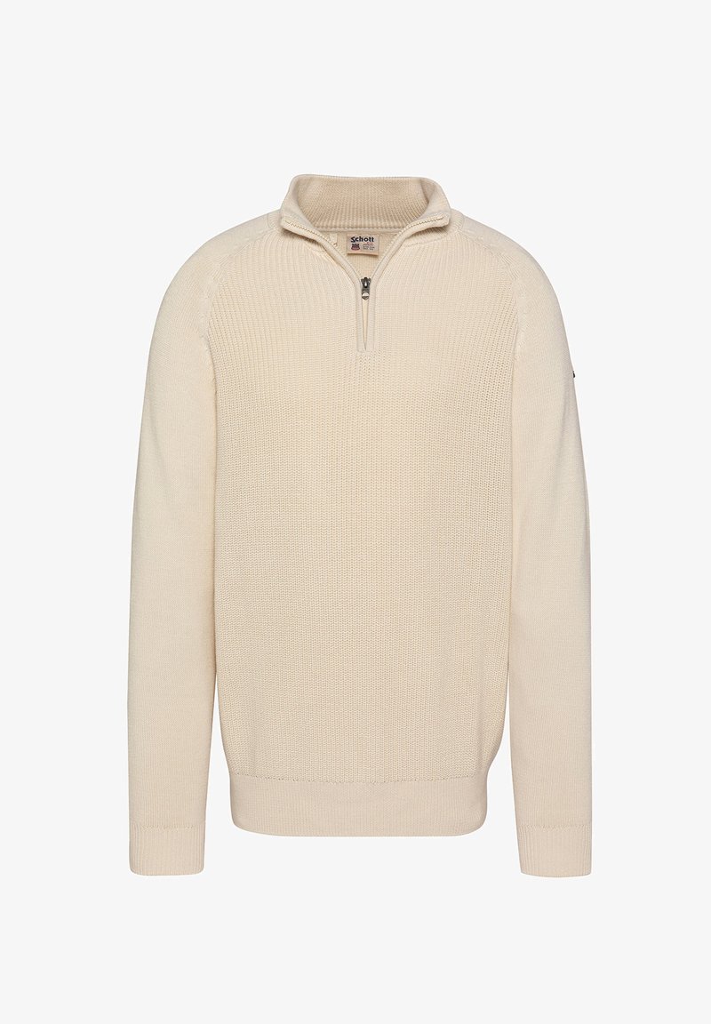 Pull en maille couleur crème avec manches longues, fermeture éclair courte au col et étiquette de marque discrète à l’intérieur de l’encolure.