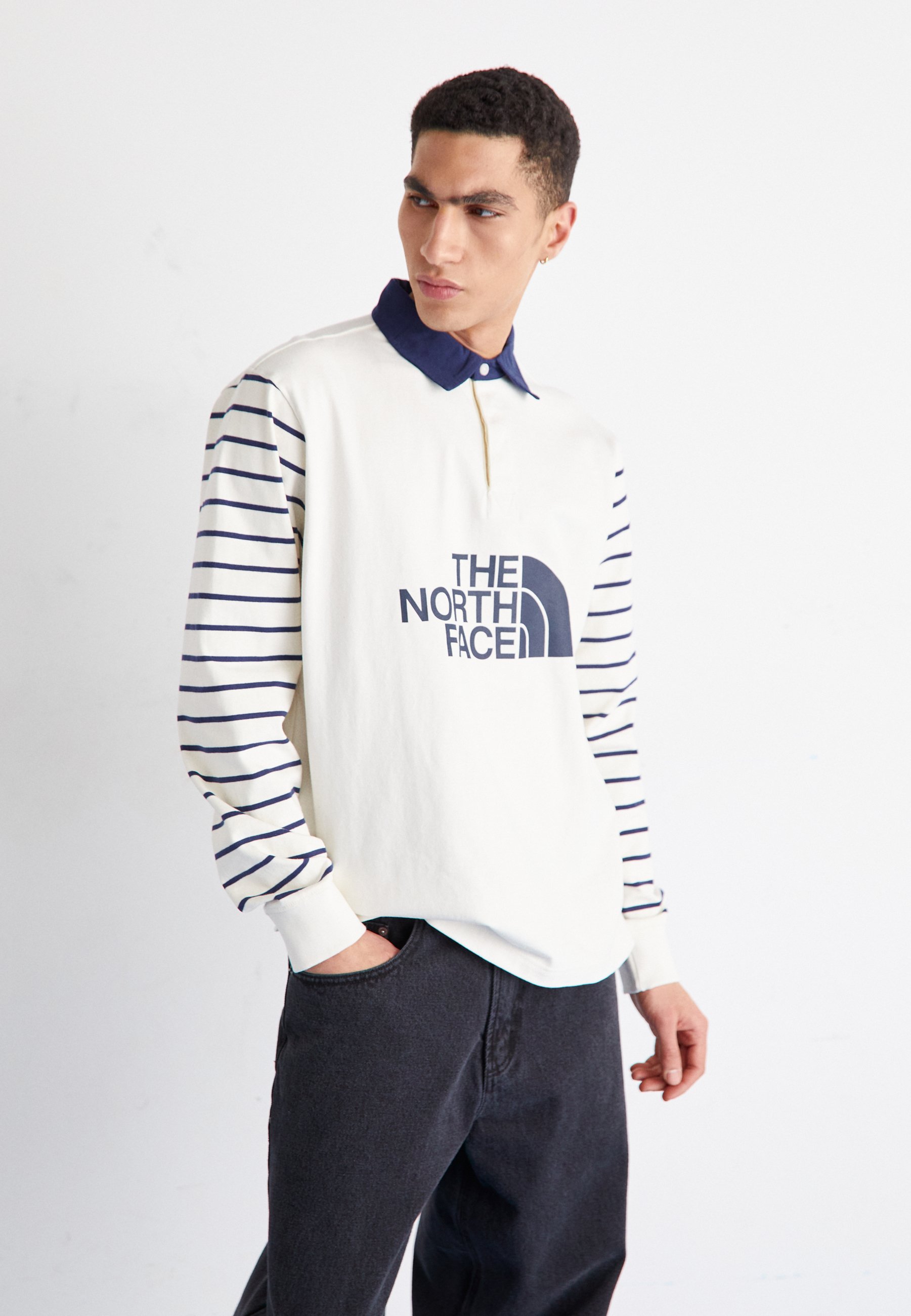 white north face polo shirt