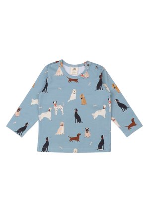 Langärmliges Kinderhemd aus hellblauem Stoff, mit bunten Hundillustrationen und Knochenmustern, ausgestattet mit Schulterdruckknöpfen für ein einfaches Ankleiden.