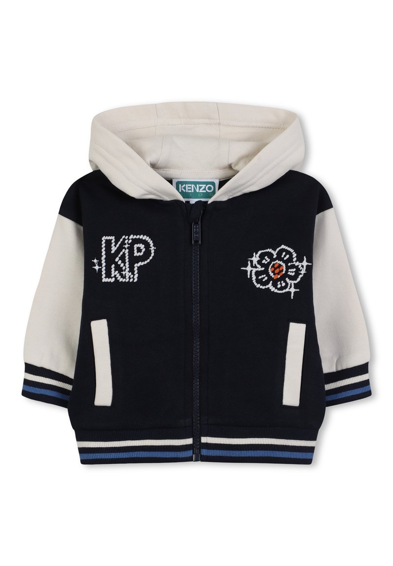 Felpa con zip blu navy e crema, con polsi e orlo a coste, decorata con ricami "KP" e design floreali sul petto. Tessuto morbido in misto cotone.