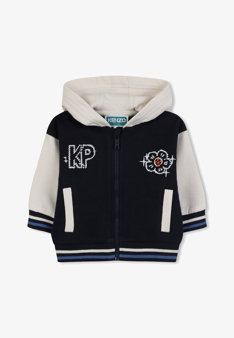 Felpa con zip blu navy e crema, con polsi e orlo a coste, decorata con ricami "KP" e design floreali sul petto. Tessuto morbido in misto cotone.