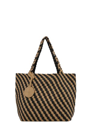 Woven tote bag in tan and black, featuring a diagonal striped pattern, sturdy woven handles, and a round leather tag attached.