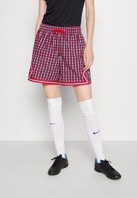 Nike Performance Sportovní kraťasy - red