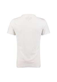 Witte katoenen t-shirt met korte mouwen, ronde hals en een gladde textuur. Bevat een bedrukte label op de bovenste achterkant.