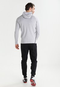 Erima ESSENTIAL  - Pantalon de survêtement - black