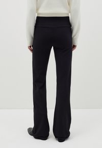 B.ANGEL FLARE-FIT STRETCH - Legging (type pantalon) - black