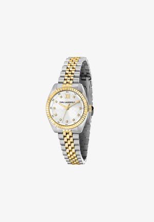 Tofarvet sølv- og guldkolors armbåndsur med hvid urskive, tolv timeindikatorer af krystaller, gyldigt romertal XII og Karl Lagerfeld-logo.