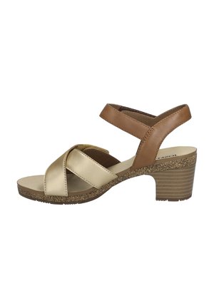 Damenabsatzsandalen mit überkreuzten metallischen goldenen und braunen Riemen, gepolsterter Innensohle und strukturiertem braunen Absatz.