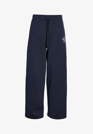 Tumedate sinelihased pehmest kangast, laia jala disainiga, elastse vöökoha ja nööriga ning väikese logodetailiga.