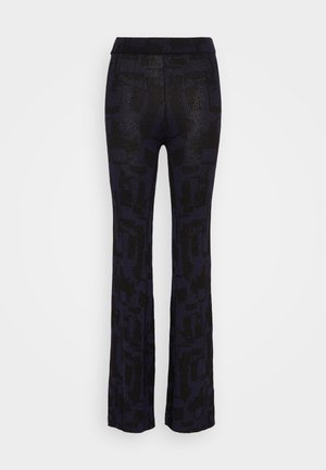 Knit trousers in dark blue and black, featuring a textured pattern. Flared leg design with an elastic waistband for comfort.