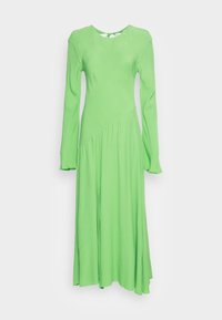 Abito a maniche lunghe di un vivace verde, realizzato in un tessuto morbido con un design asimmetrico e un dettaglio con apertura sul retro.