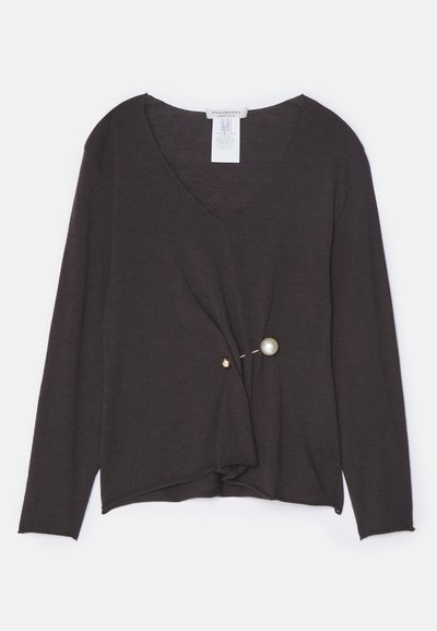 Dark brown long-sleeve top featuring a V-neck, twisted front design with a gold button and a large pearl accent on the side.