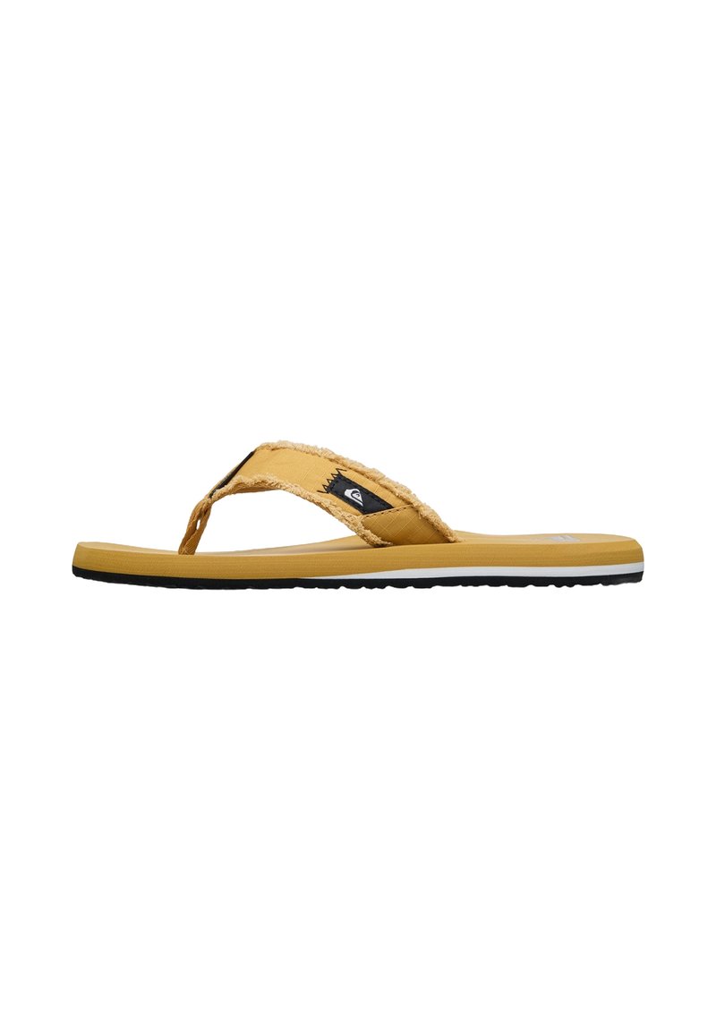 Gul flip-flop med en texturerad rem och en mjuk sula. Har en svart logomärkning och en mönstrad svart sula för bra grepp.