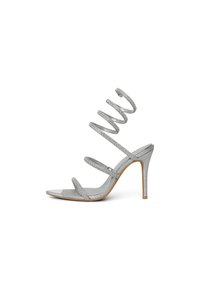 Glittery silver high-heeled sandal with spiral straps, open toe, and single metallic accent. Smooth surface and slender heels.