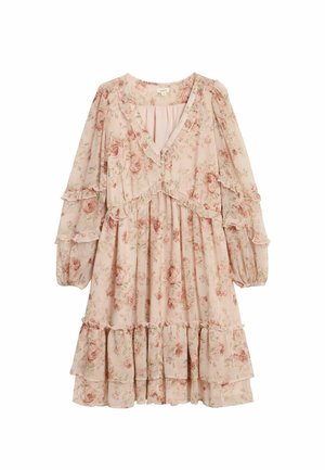 Vaaleanpunaisesta kankaasta valmistettu kukkamekko, jossa on röyhelöhihat ja kerroksittaiset helmat. Mekossa on V-pääntie ja edessä nappikoriste lisäämässä designia.