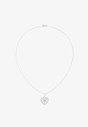 Collier délicat en argent avec un pendentif en forme de cœur orné de motifs floraux et géométriques découpés complexes.