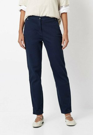 Navy blue cotton blend pants with a straight-leg cut, featuring a button and zipper closure, side pockets, and a smooth texture.