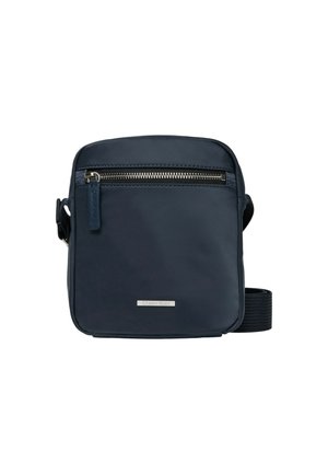 Navy crossbody bag in durable material, featuring a zippered front pocket, adjustable strap, and a small logo plate on the front.