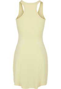 Vestido amarillo sin mangas con cuello redondo, hecho de un material ligero, que presenta un corsé ajustado y un dobladillo acampanado.