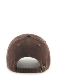 Brown baseball cap viewed from the back with adjustable strap and small metal buckle against white background.