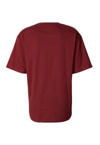 Burgundia puuvillane T-särk ümmarguse kaelusega, lühikeste varrukatega ja lõdva lõikega. Selg on lihtne, ilma nähtavate logode või mustriteta.