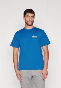 Nike Performance Camiseta estampada - court blue pink foam