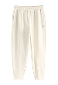 Kreminės spalvos laisvalaikio kelnės su elastiniu juosmeniu, šoniniais kišenėmis ir subtiliomis siuvimo detalėmis. Pagamintos iš minkštos medžiagos, suteikiančios komfortą.