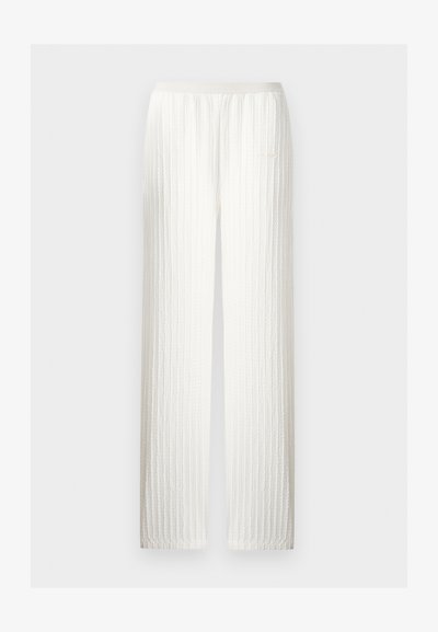 Εκρού πλεκτό παντελόνι με κάθετο καλωδιακό σχέδιο, ίσια γραμμή και ελαστική μέση.