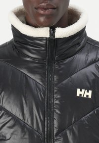 Helly Hansen VILLAGE HYBRID UNISEX - Sulejope - black
