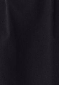 Black fabric with a smooth texture, featuring a consistent matte finish. No visible patterns or notable details.