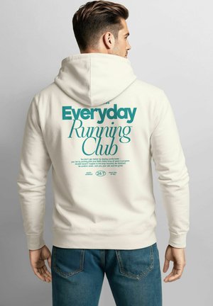 Cremefarbener Hoodie mit Rückendruck in Teal. Der Text enthält "Everyday Running Club" und motivierende Sprüche. Mit gerippten Bündchen und Saum.