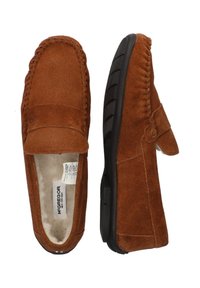 Brune corduroy slip-on sko med sorte gummisåler, der har dekorativ syning på overdelen og en blød foring.