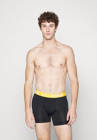 Nike Underwear ESSENTIAL 3 PACK - Cuecas boxer - black/malachite/ochre/game royal