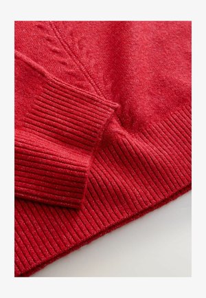 Red sweater with a soft texture, featuring ribbed cuffs and hem. Subtle pattern detail woven into the fabric. Cozy and warm appearance.