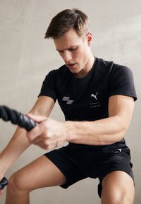 Puma HYROX FIT ULTRABREATHE TRIBLEND TEE - T-shirt de sport - black