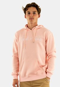 Felpa rosa con logo bianco "Project x Paris". Presenta coulisse e tasca frontale, realizzata in un tessuto morbido e con una vestibilità comoda.